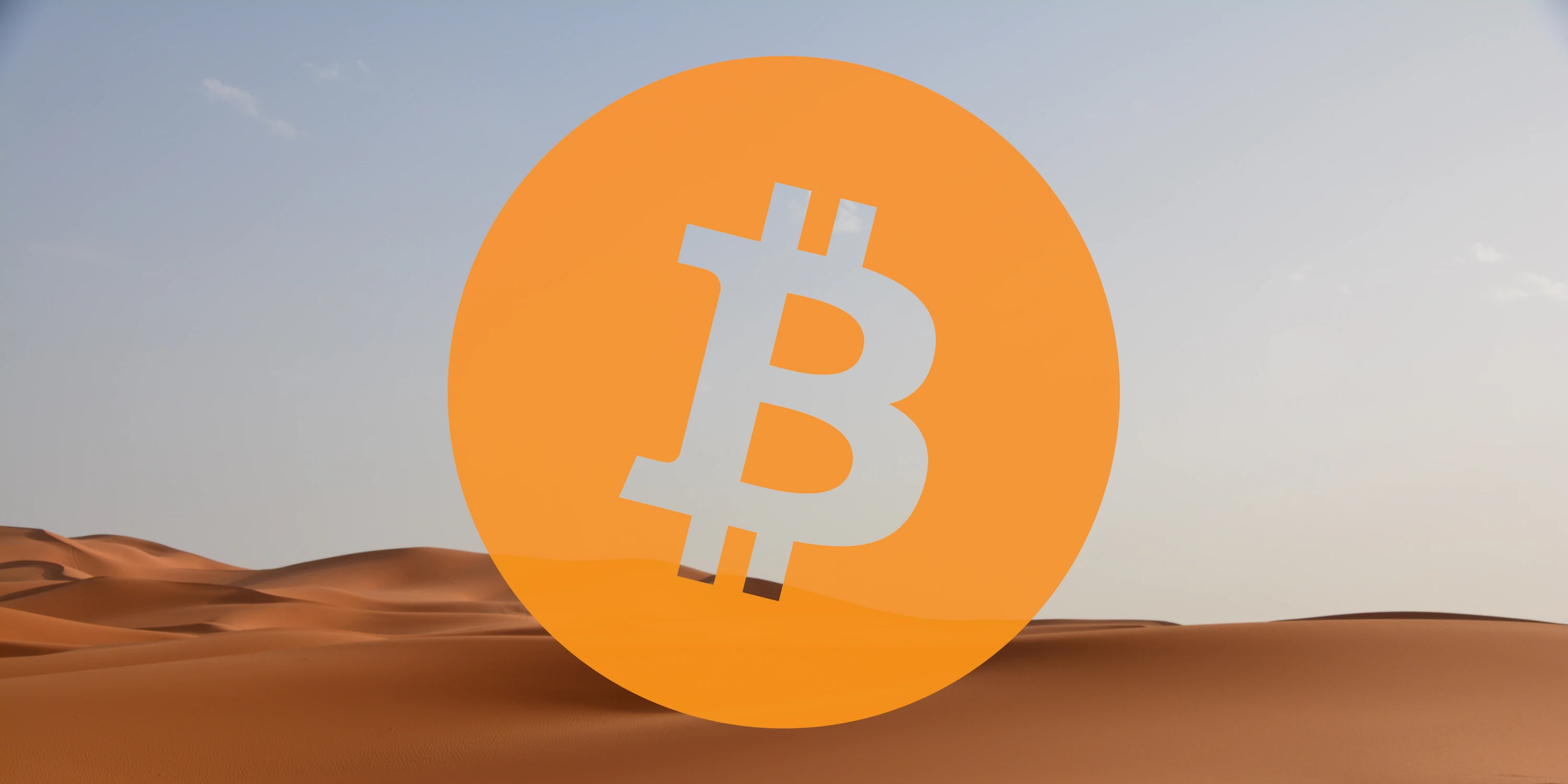 Bitcoin logo overlaid on a desert picture