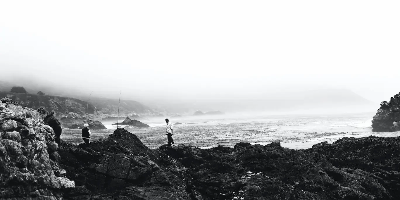 Black and white photograph of fisherman